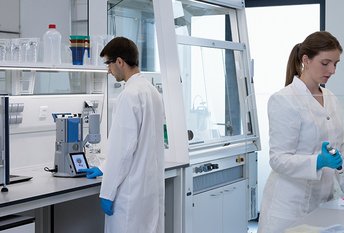 Two employees in the lab